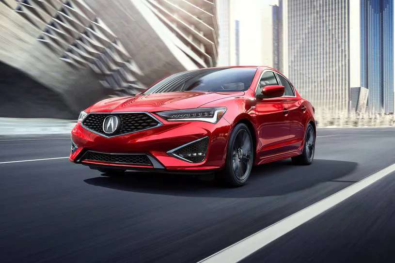 red ACURA ILX front angular view in the motion