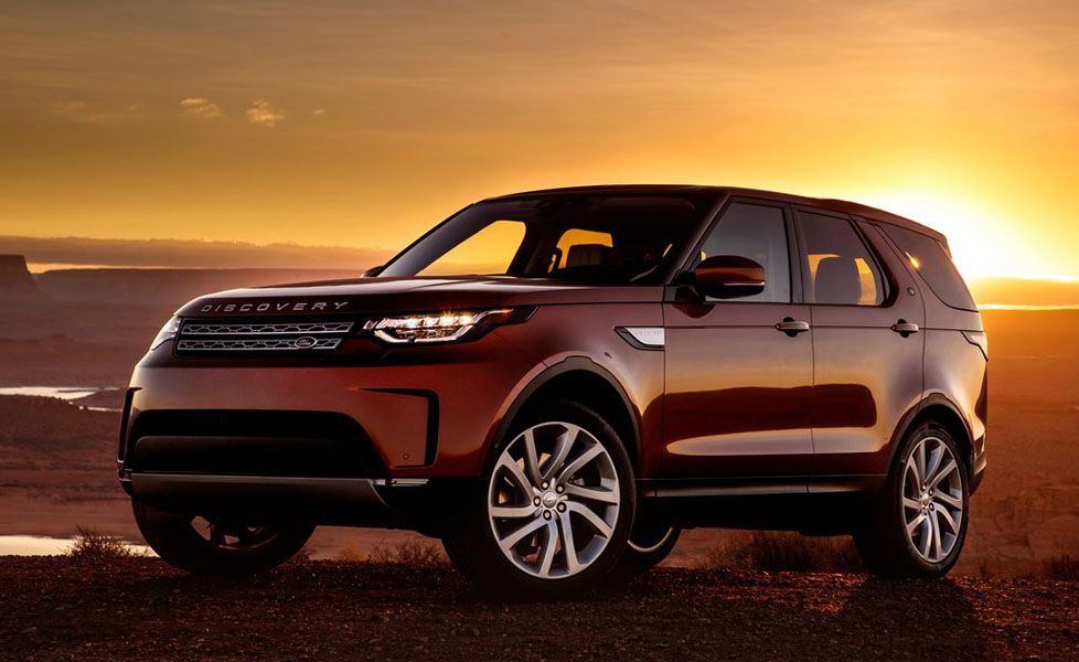 red LAND ROVER DISCOVERY front angular view