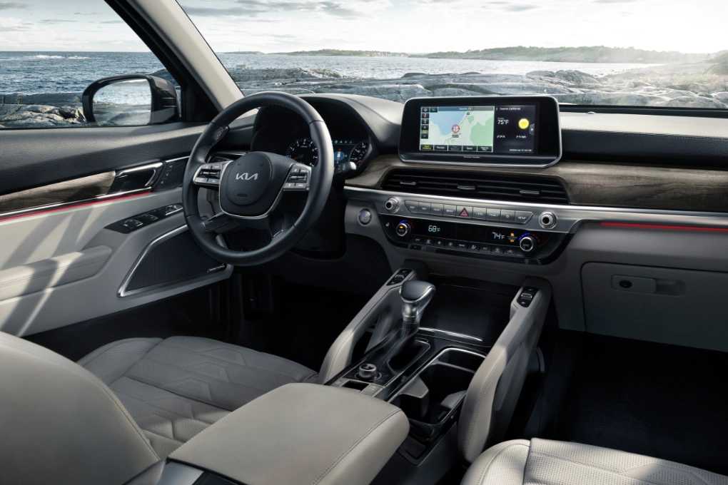 kia telluride front seat with the steering wheel and the infotainment system