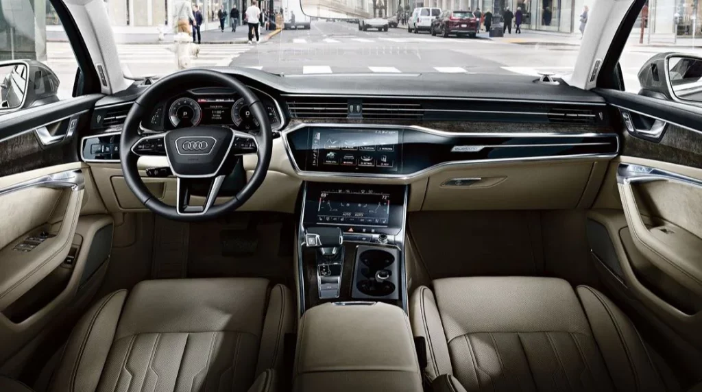 view from the driver's sea on the steering wheel and the infotainment system in 2021 audi a6