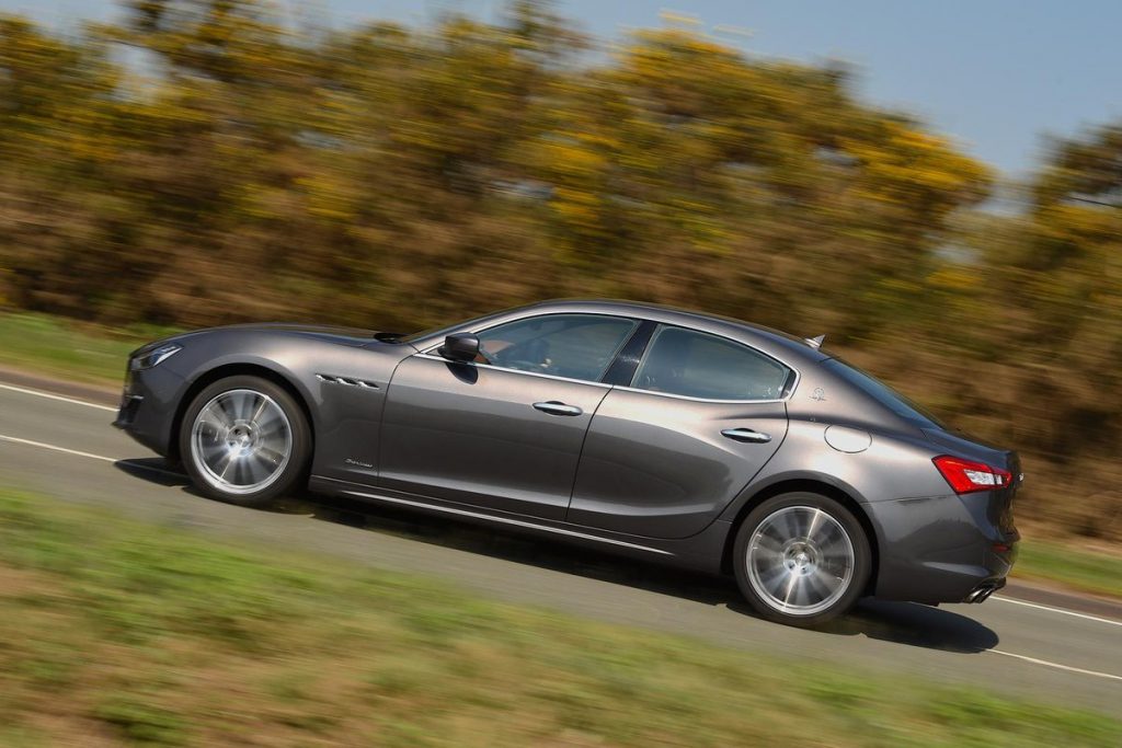 side view of maserati ghibli in the motion