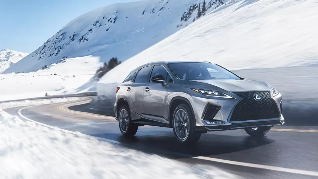 grey 2021 Lexus RX 350 on the snowy background in the motion