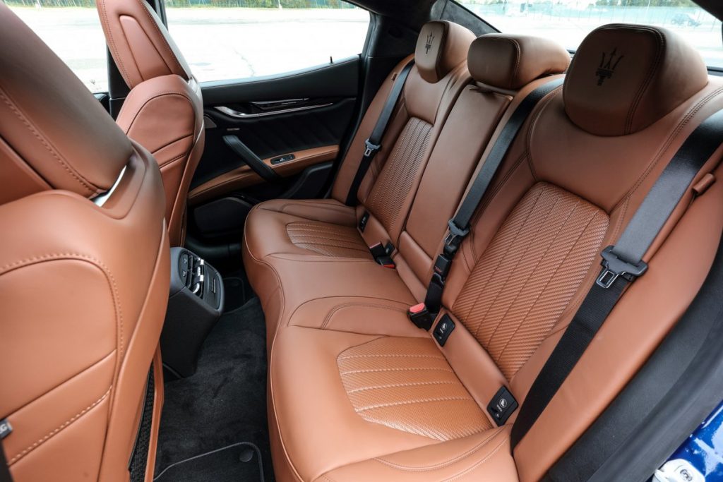 brown leather seats inside of the cabin of maserati ghibli