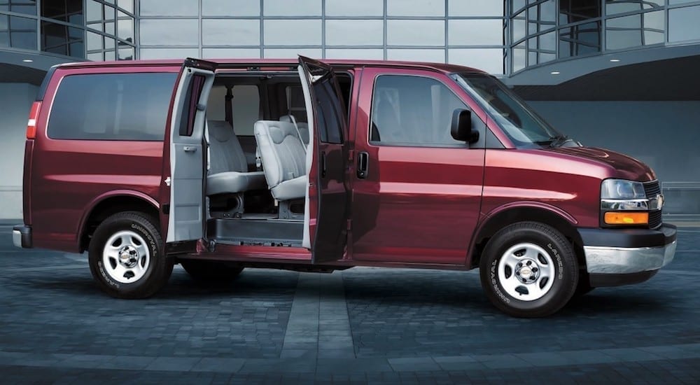 red Chevy Express Cargo with open doors