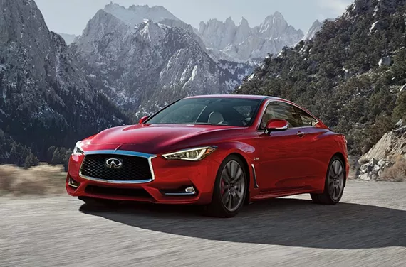INFINITI Q60 RED SPORT 400 front angular view on the mountains background