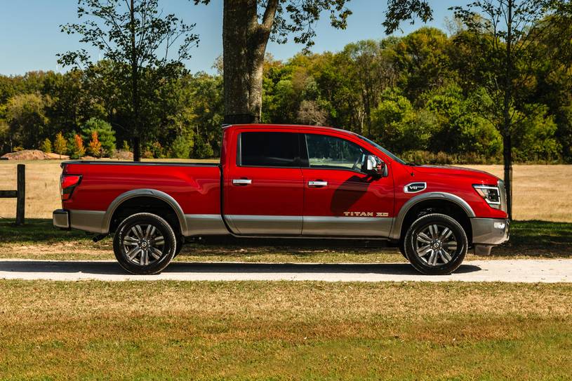 nissan titan xd lease side view red edition 