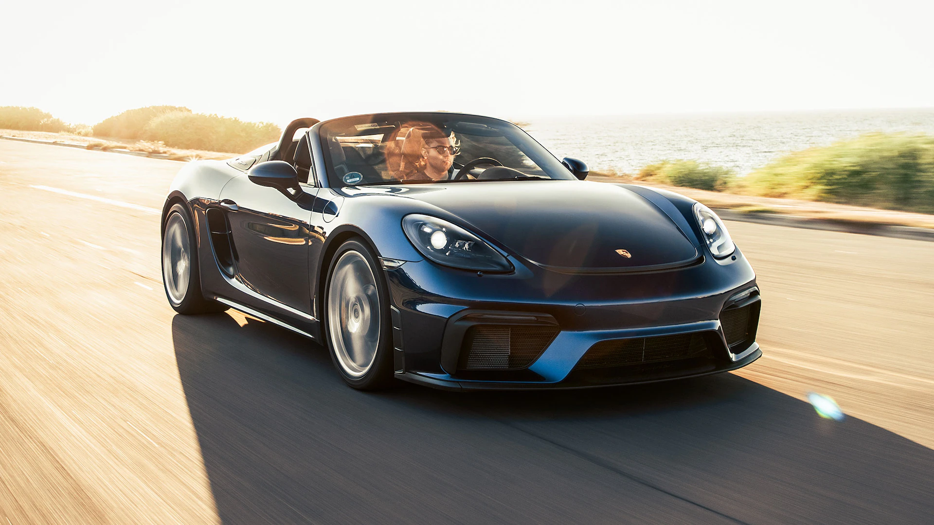 Porsche 718 Boxster Spyder FRONT ANGULAR VIEW ON THE ROAD