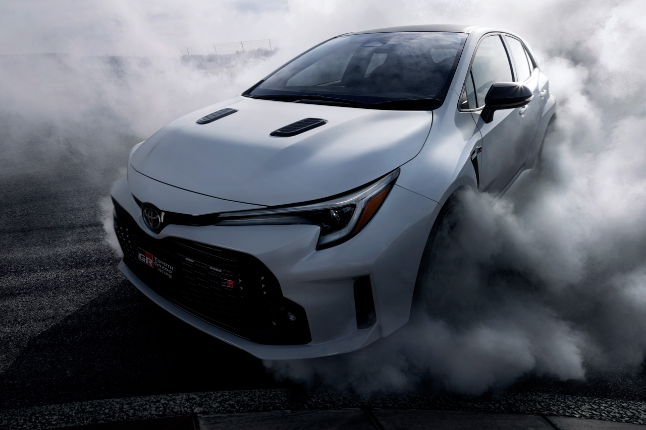 toyota sedan front view with fumes around