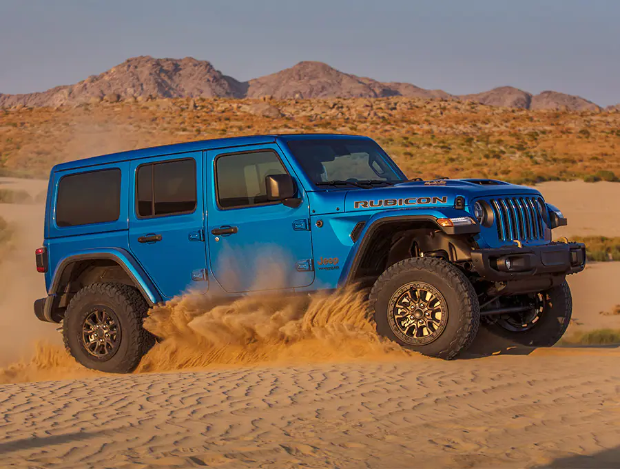 blue Jeep Wrangler Unlimited Rubicon 392 front profile in the desert