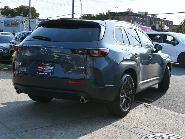 Images of 2025 Mazda CX-50 exterior, interior, tech dashboard, and side view