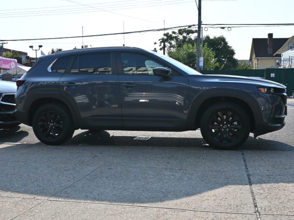 Images of 2025 Mazda CX-50 exterior, interior, tech dashboard, and side view