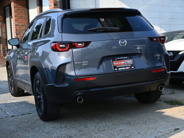 Images of 2025 Mazda CX-50 exterior, interior, tech dashboard, and side view