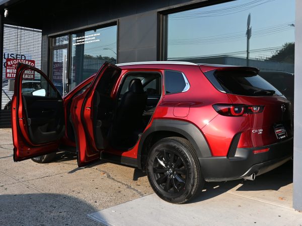 Images of 2025 Mazda CX-50 red exterior, interior, tech dashboard, and side view